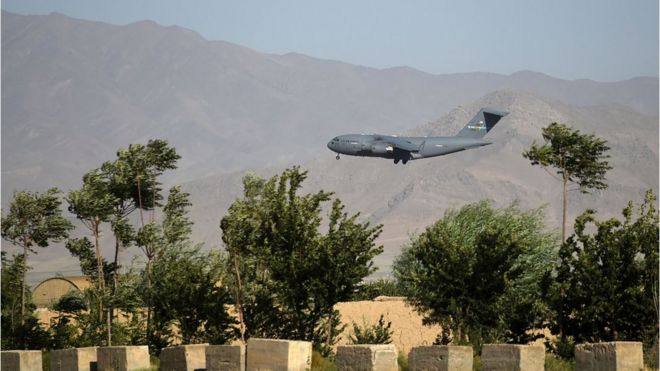 A US Air Force transport plane lands at the Bagram Air Base in Bagram on July 1, 2021