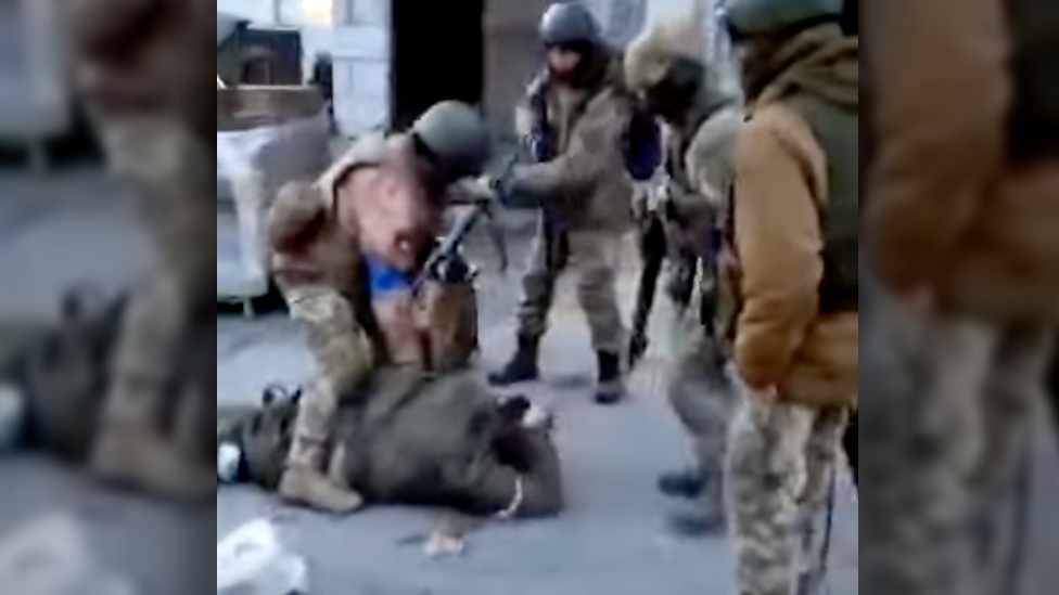 Still from video claiming to show mistreatment of Russian prisoners