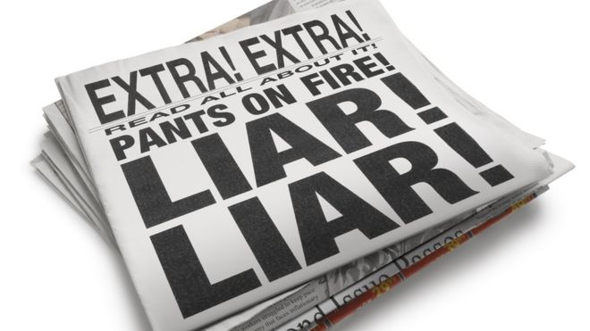 Newspaper with 'Liar Liar' headline