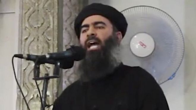 Image made from video posted on a militant website Saturday, July 5, 2014 Abu Bakr al-Baghdadi