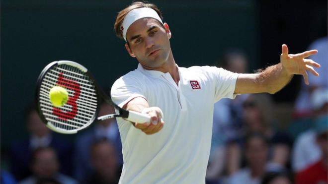 Roger Federer in action during the first round match