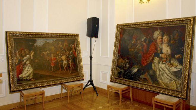 Paintings are seen on display during a news conference at the Ukraine"s Security Service headquarters in Kiev, Ukraine, April 14, 2016.
