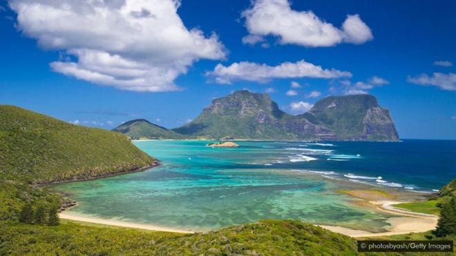 Lord Howe Island hugs a turquoise lagoon rimmed with the world's southernmost coral reef