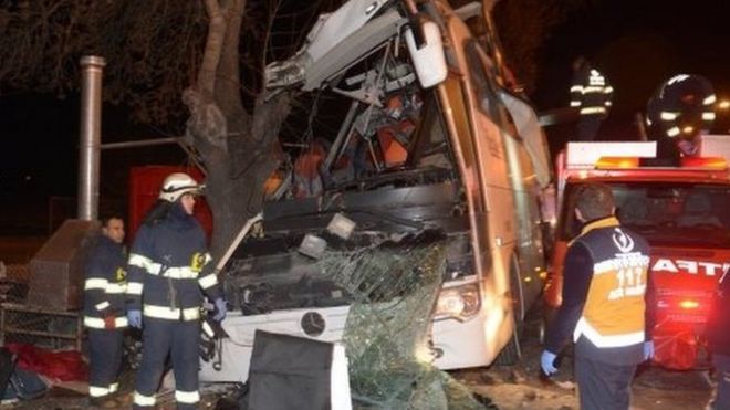 Members of the emergency services inspect the scene of a passenger bus accident in Eskisehir, Turkey, 20 January 2018.