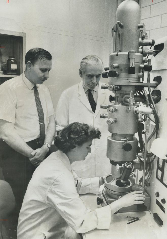 June Almeida with her electron microscope