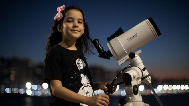 Nicole and her telescope