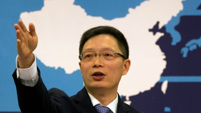 Taiwan Affairs Office spokesman An Fengshan signals for questions from a journalist at a routine press conference in Beijing, China