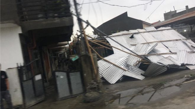 Разрушенная крыша здания в Тугуэгарао