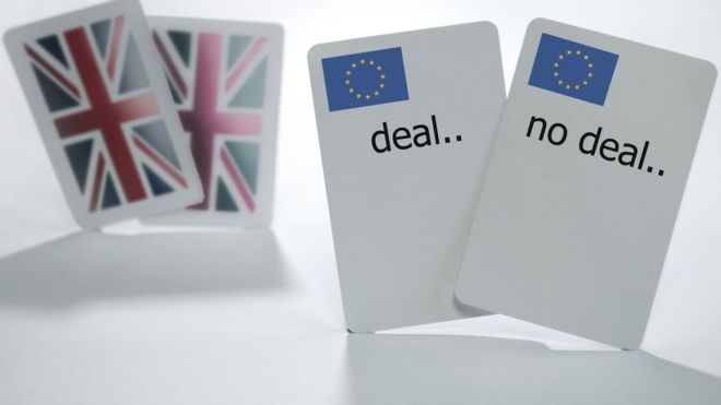 Playing cards with "deal" or "no deal" written on them