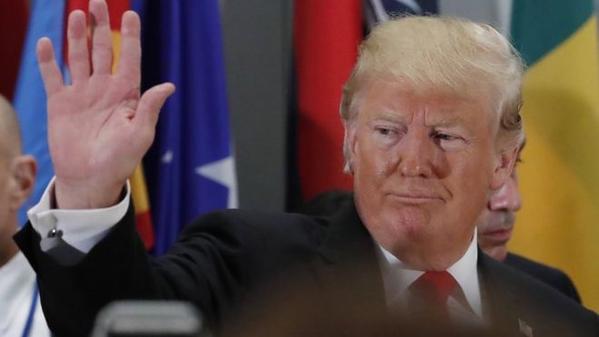 US President Donald Trump waves as he arrives on the sidelines of the UN General Assembly in New York, 25 September 2018