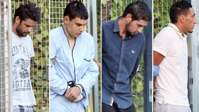 Подозреваемые в нападении на Барселону (слева направо) Мохаммед Ааллаа, Мохамед Хули Чемлал, Сахал аль-Кариб и Дрисс Оукабир прибывают в суд в Мадриде во вторник, 22 августа 2017 года