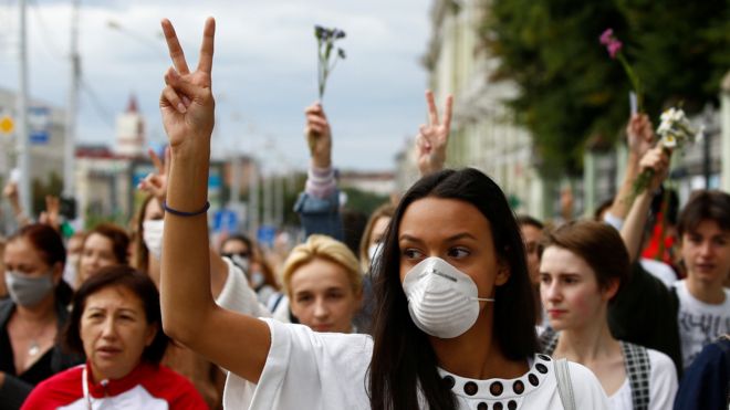 Women take part in a demonstration against police violence in Minsk