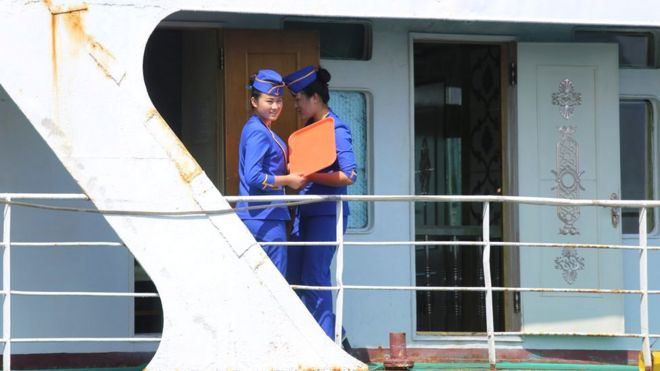 Two women aboard a ship