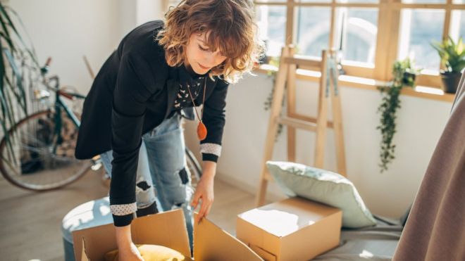 Woman unpacking