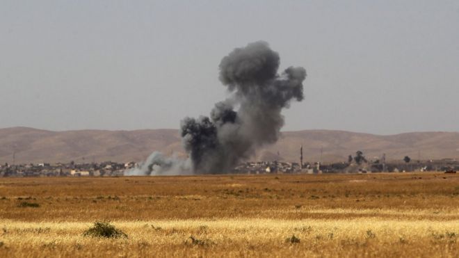 Smoke billows as Iraqi forces and militia fighters advance towards the city of Tal Afar. 20 Aug 2017