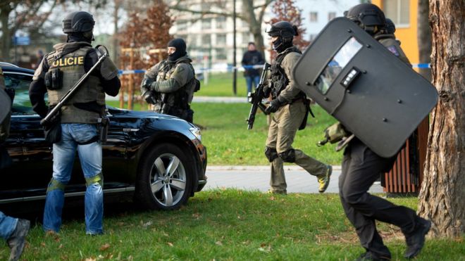 Armed police arrive at the scene of a shooting at a hospital in Ostrava, Czech Republic, 10 December 2019