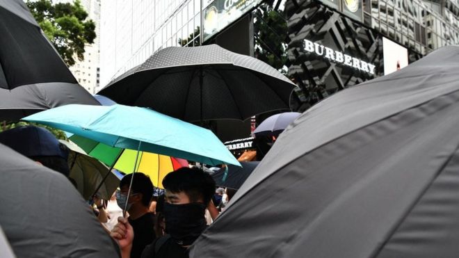 Hong Kong protestors outside a Burberry store