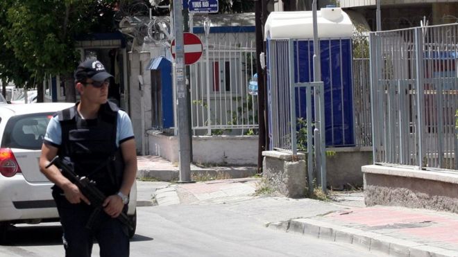 Turkish police officer patrols in Ankara, 23 June 2012