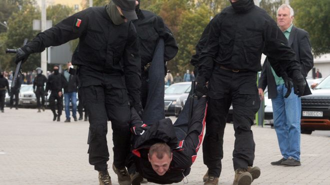 Police detain a protester in Minsk on 27 September 2020