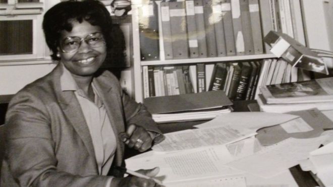 Gladys West at her office desk