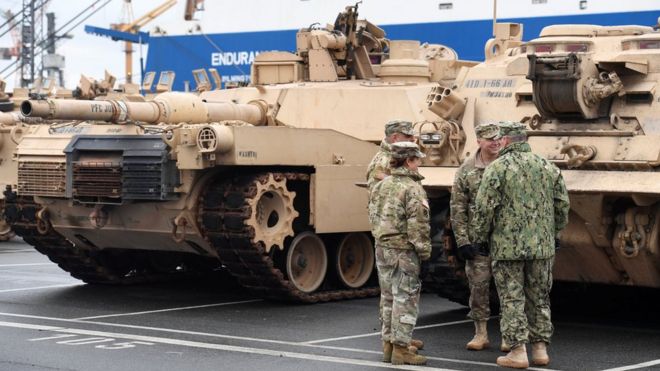 U.S. tanks, trucks and other military equipment, which arrived by ship, are unloaded in the harbour of Bremerhaven, Germany January 8, 2017