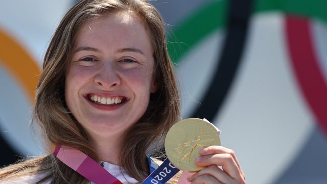 Charlotte Worthington poses with her gold medal for the BMX freestyle event