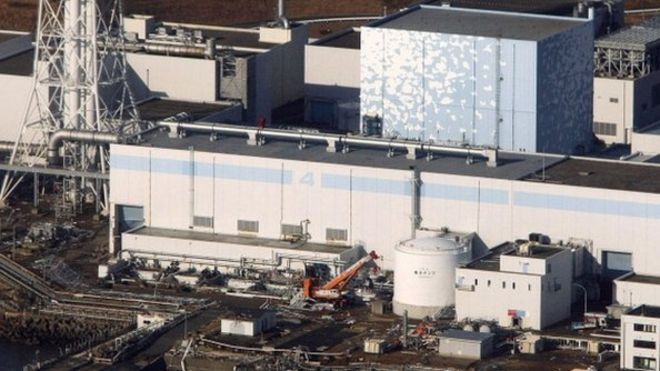 An aerial view shows the quake-damaged Fukushima nuclear power plant in the Japanese town of Futaba, Fukushima prefecture on 12 March, 2011