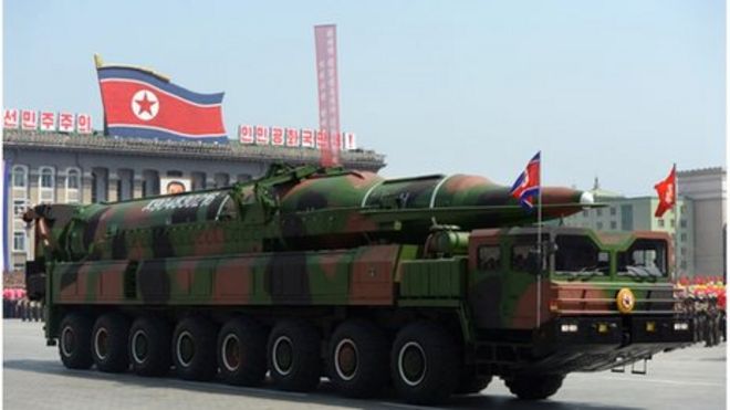This file photo taken on April 15, 2012 shows a military vehicle carrying what is believed to be a Taepodong-class missile