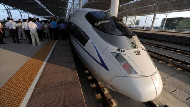 A high-speed train arrives at the Bengbu station, east China's Anhui province, one of the stops of the Beijing to Shanghai line which was launched on June 30, 2011