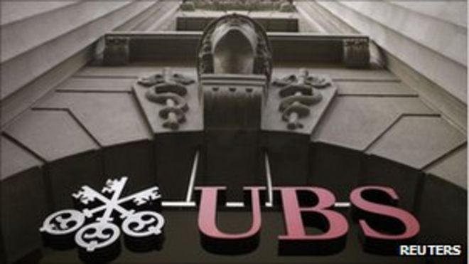 Логотип швейцарского банка UBS можно увидеть в офисе компании на Банхофштрассе в Цюрихе на фотографии, сделанной 1 июля 2009 года.
