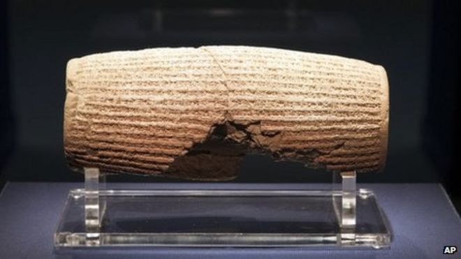 In this image provided by The Smithsonian Institution, the Cyrus Cylinder is seen on display at the Smithsonian's Freer Sackler Gallery in Washington