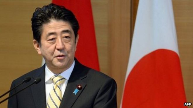 Премьер-министр Японии Синдзо Абэ выступает с речью в Токио, 13 декабря 2013 г.
