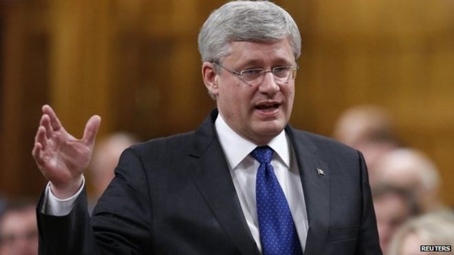 Премьер-министр Канады Стивен Харпер выступает в период вопросов в Палате общин на Парламентском холме в Оттаве 11 июня 2014 года