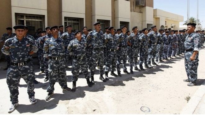 Добровольцы, присоединившиеся к иракской армии для борьбы с суннитскими боевиками, в Багдаде - 8 июля 2014 года