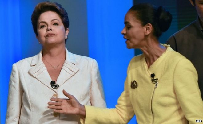 Дилма Руссефф (слева) и Марина Сильва предстали перед последними телевизионными дебатами в Рио-де-Жанейро, Бразилия, 2 октября 2014 года