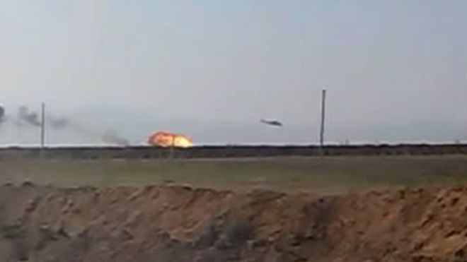 Один из двух армянских вертолетов в огне
