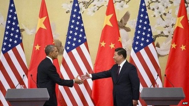 Президент США Барак Обама и президент Китая Си Цзиньпин пожимают друг другу руки