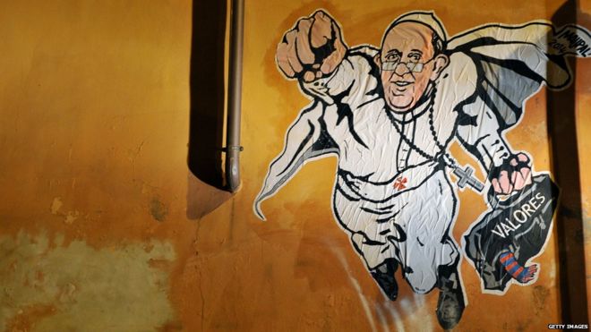 Граффити в Риме с изображением папы как супергероя