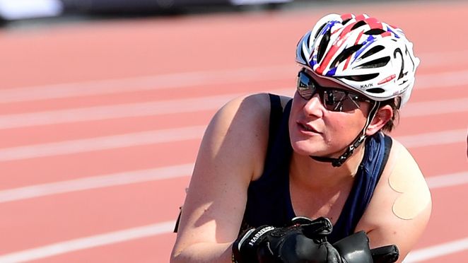 Dr Jen Warren competing at the Invictus Games, she is wearing a helmet and sunglasses