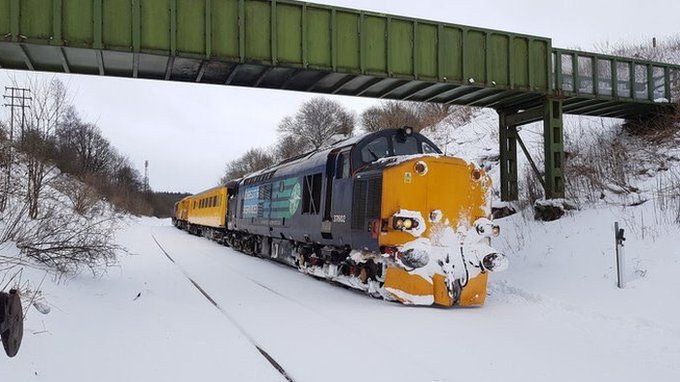 A snow plough on the railway in Scotland