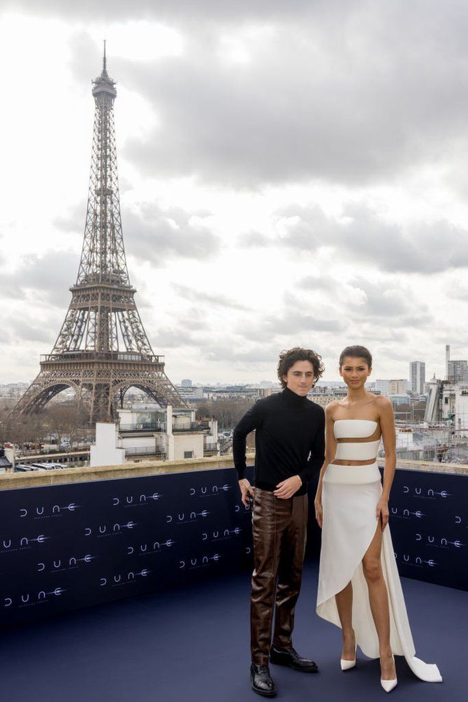 Chalamet and Zendaya pose in front of the Eiffel Tower while promoting the film in Paris