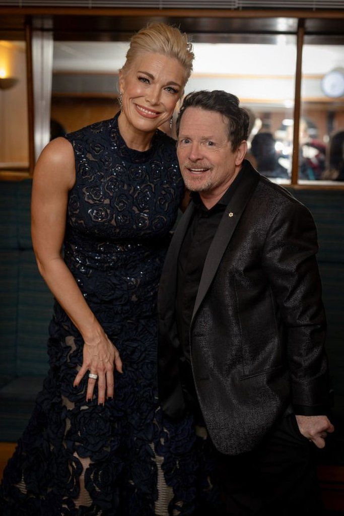 Hannah Waddingham and Michael J. Fox backstage during the EE BAFTA Film Awards 2024