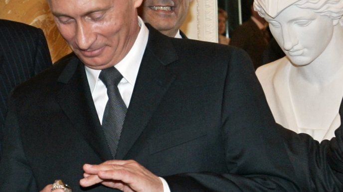 File photo of President Vladimir Putin with diamond-encrusted Super Bowl ring