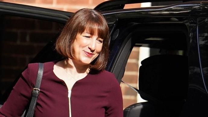 Chancellor Rachel Reeves getting out of a car