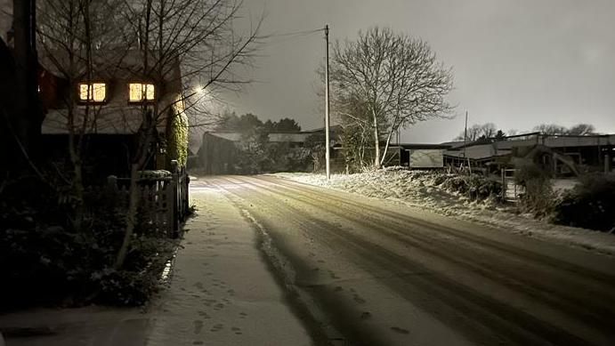 A snowy road in Warwickshire