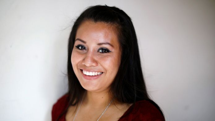 Evelyn Hernández poses for a photo after a news conference