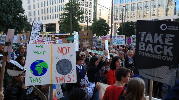 Protesters at the UK Student Climate Network"s Global Climate Strike in Manchester.