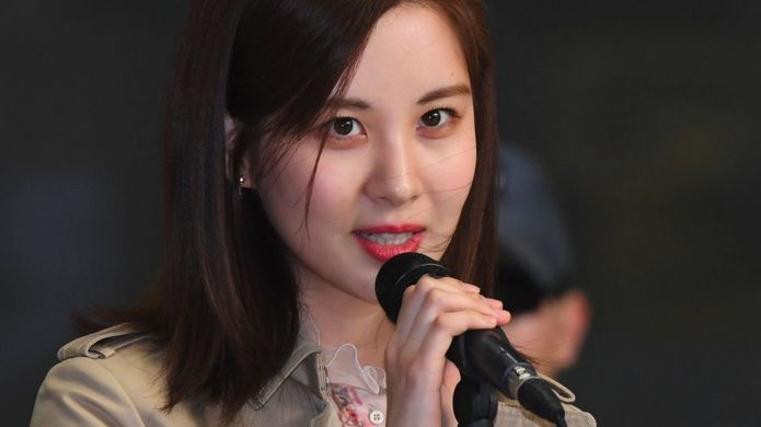 South Korean actress and singer Seohyun speaks to the media before departing for Pyongyang from Gimpo International Airport in Seoul on March 31, 2018