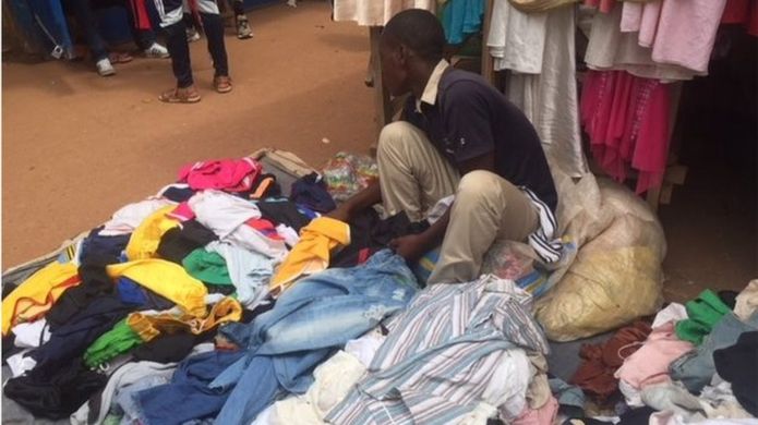 Man in a Kigali clothes market