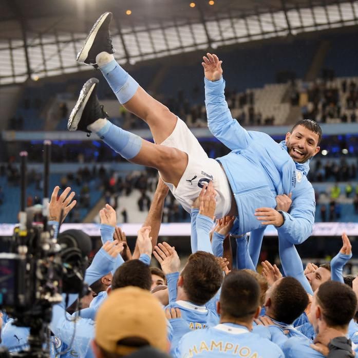 Sergio Aguero is hoisted aloft by Manchester City team-mates after his final appearance
